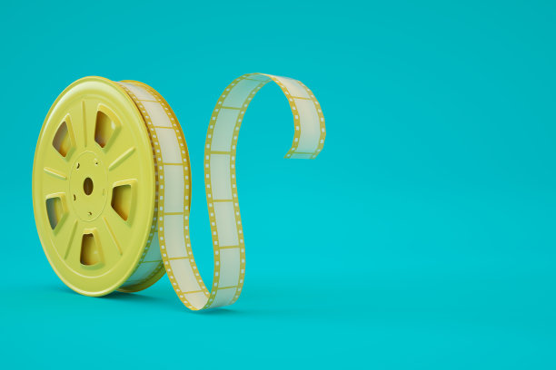 蓝色背景的电影胶片卷图片下载