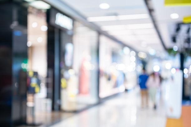 散景抽象模糊的光线内购物商场的背景图片下载