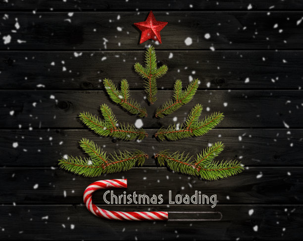 圣诞节装载概念-糖果甘蔗在黑板上与圣诞树。图片下载