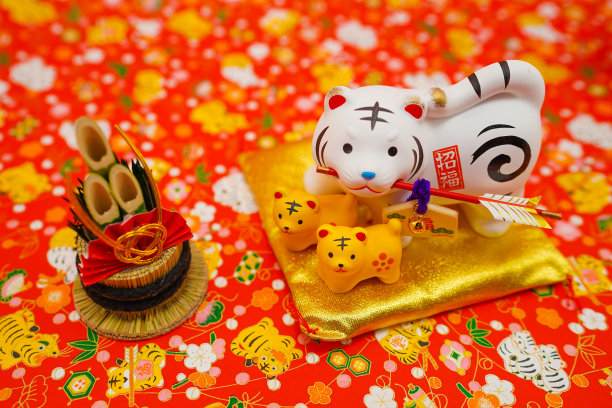 老虎娃娃和背景背景(年卡材料)图片下载