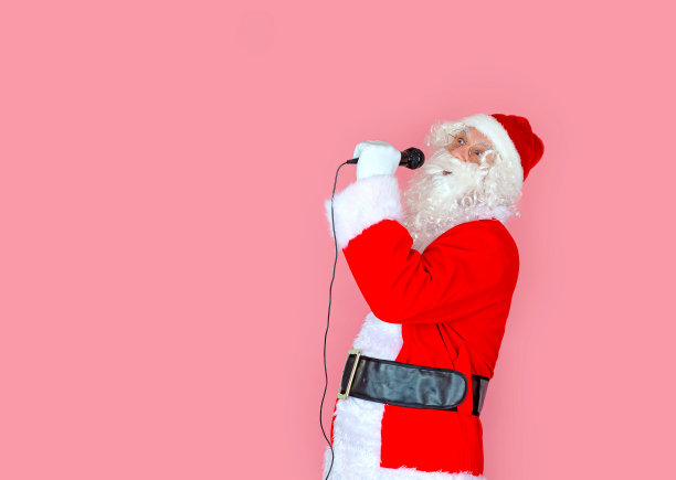 圣诞老人用麦克风唱歌图片下载