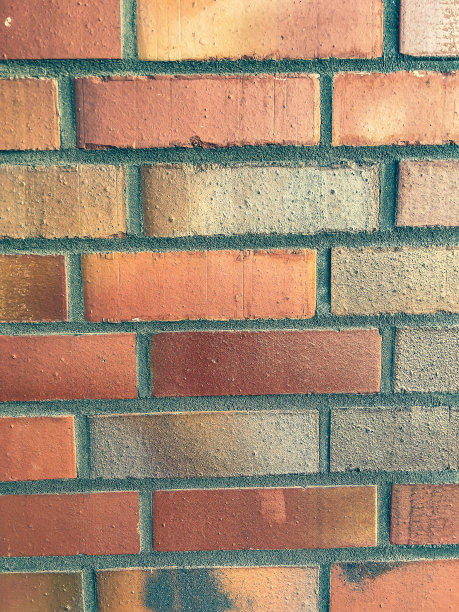 红砖砌成的墙。图片下载