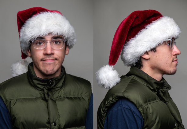 严肃的年轻人，戴着圣诞老人帽的正面和侧面头像图片下载
