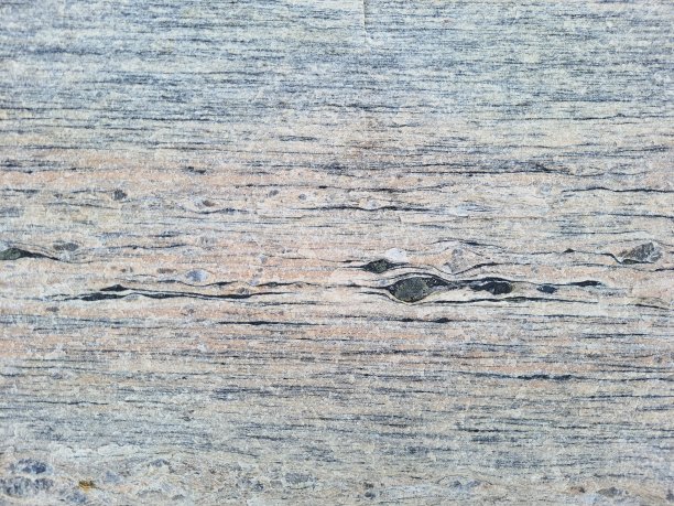 背景纹理和图案的花岗岩墙在采石场在完整的框架。关闭了。宏图片下载