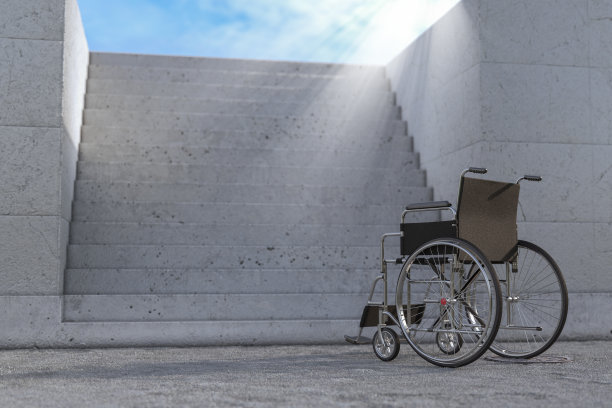 混凝土楼梯前的空轮椅。3d渲染图片下载