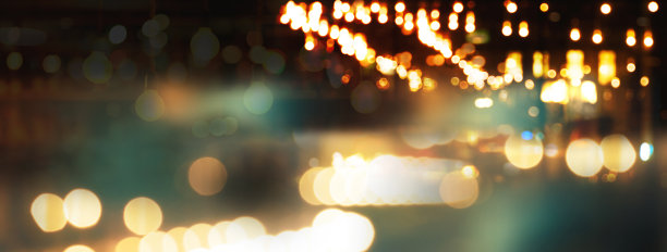 模糊的城市灯光在黑暗的城市夜晚为圣诞派对酒吧灯光抽象的旗帜背景图片下载