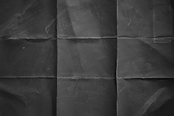 三分法构图的黑色折痕纸图片下载