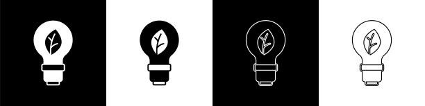 设置灯泡与叶图标孤立在黑白背景上。生态能源的概念。替代能源的概念。向量图片下载