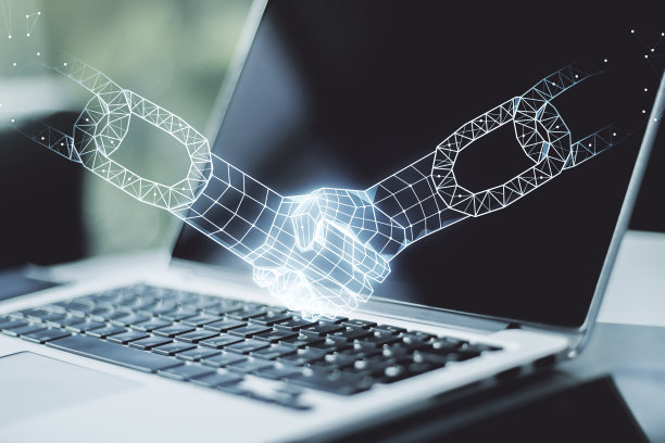 现代笔记本电脑背景下区块链技术与握手的创意概念。数字货币转移和去中心化概念。Multiexposure图片下载