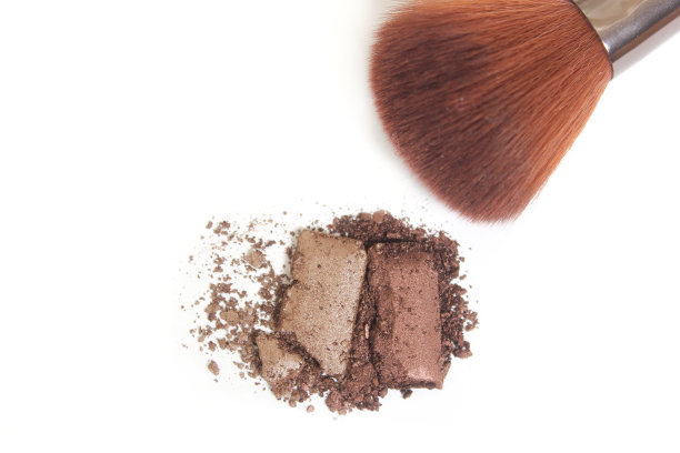 破碎的古铜色或轮廓粉在白色背景上图片下载