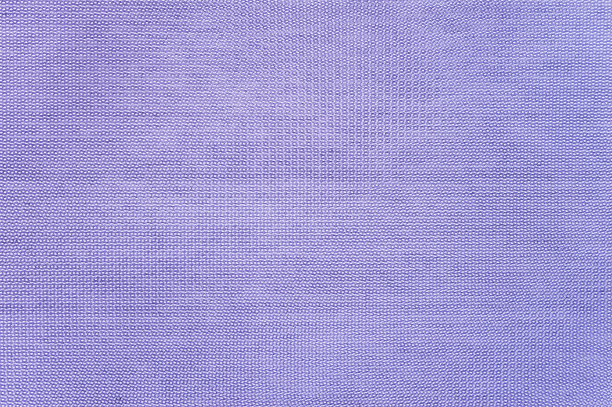 平坦的紫色有纹理的织物图案。图片下载