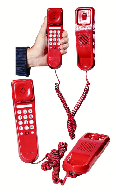 老式的红色模拟长途电话。图片下载