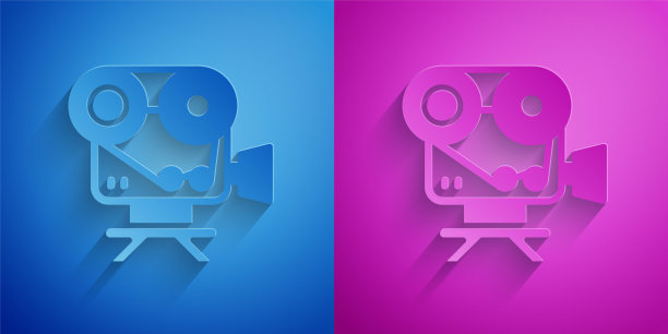 剪纸复古电影相机图标孤立在蓝色和紫色背景。摄像机。电影的迹象。电影放映机。纸艺术风格。向量图片下载