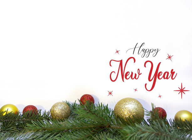 白色背景上装饰着小玩意的圣诞树，上面写着新年的祝福。假期的概念图片下载