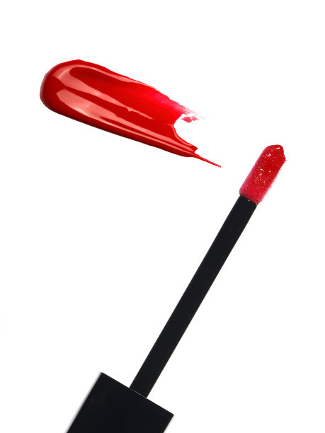 液体乳脂涂抹在白色唇膏上图片下载
