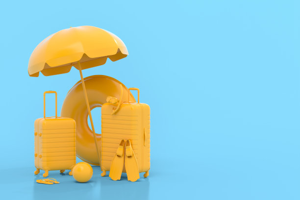 手提箱与沙滩伞和充气环单色蓝色背景。图片下载