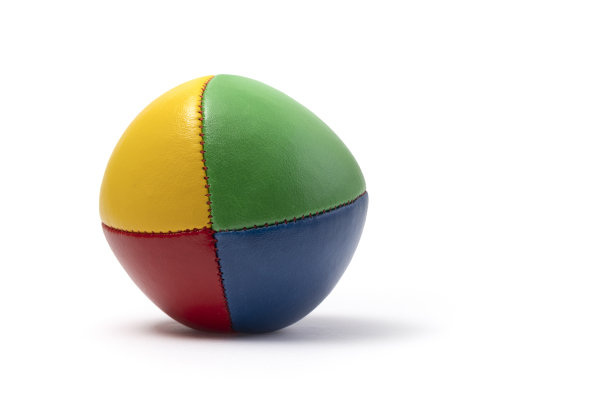 彩色杂耍球-反对一个白色的背景图片下载