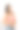 美丽的女人在工作室摆姿势。这是一张快乐的年轻黑发女郎的照片，她穿着米色上衣和灰色瑜伽或健身裤，站在灰色孤立的背景上，微笑着，一只手放在另一只手上图片下载