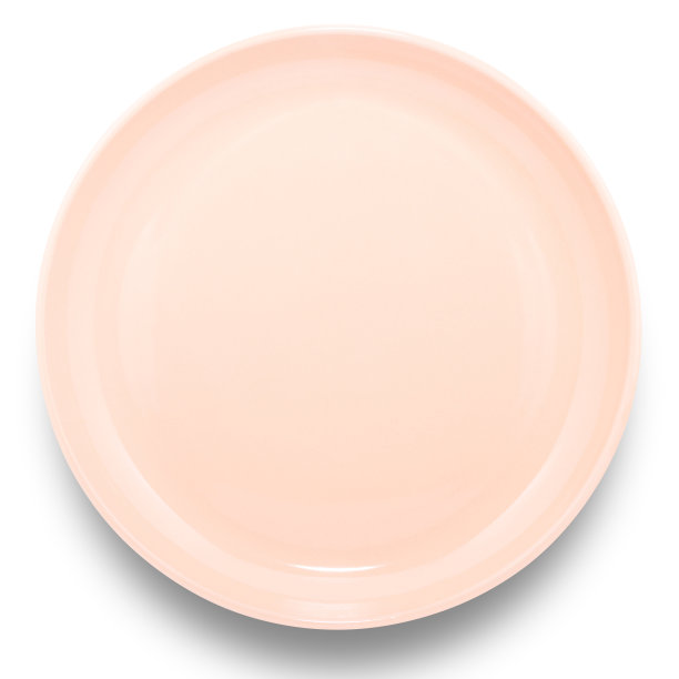 橙色圆形陶瓷板孤立在白色背景上。图片下载