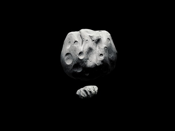 太空中有两颗巨大的小行星，有环形山，有卫星的小行星。图片下载