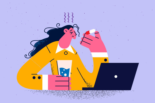 不健康的女人吃着药在电脑上工作图片下载