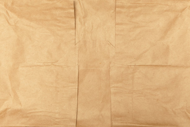 用于牛皮纸背景或硬纸板纹理的皱巴巴的纸图片下载