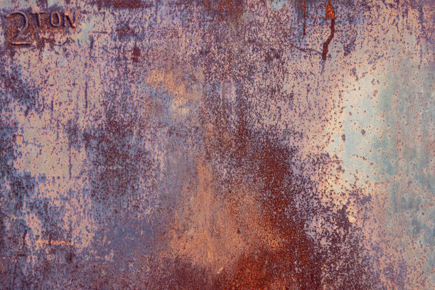 生锈染色的工业金属表面黑土纹理图片下载