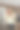年轻女子在家边喝咖啡边看手表图片下载