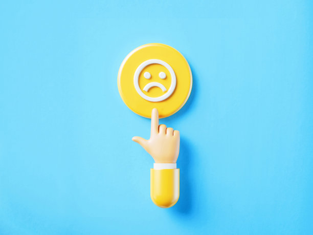 卡通风格的人手点击黄色按钮与悲伤的笑脸图片下载