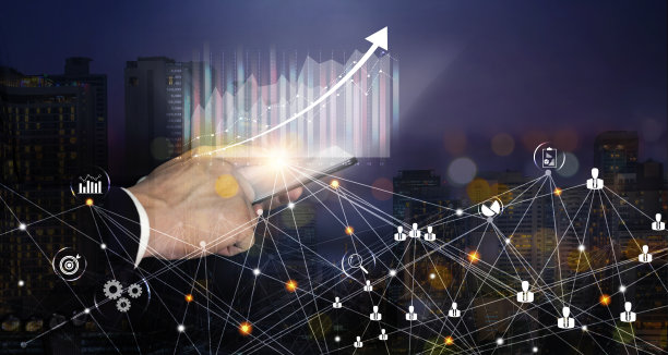 商人使用笔记本电脑和城市的双重曝光与全球网络图片下载
