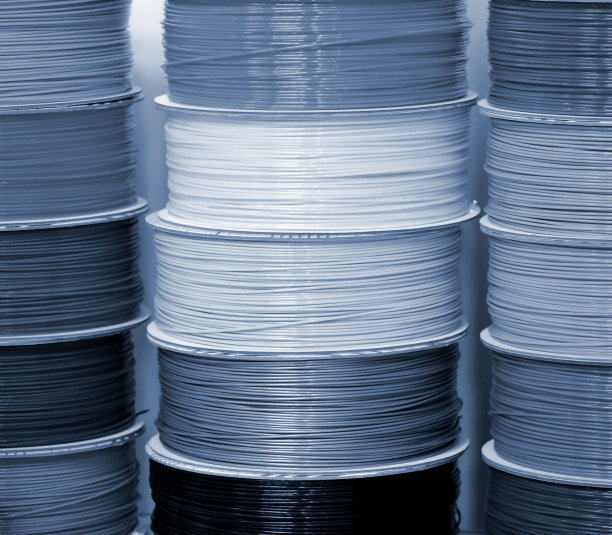 用于3D打印机特写镜头的塑料卷。用于3D打印机的丝线轴图片下载