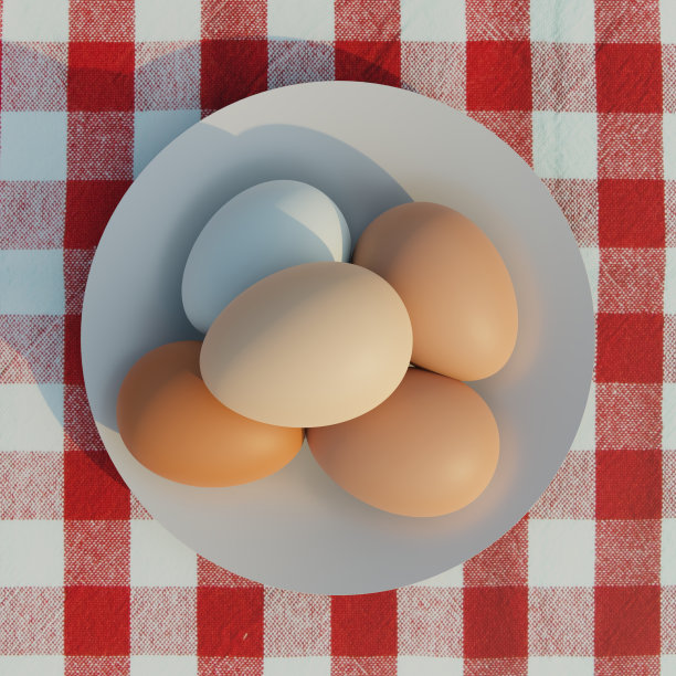 桌子上白色盘子里的鸡蛋。图片下载