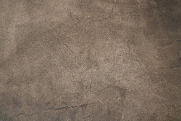 无缝的棕色混凝土纹理。石墙背景图片下载