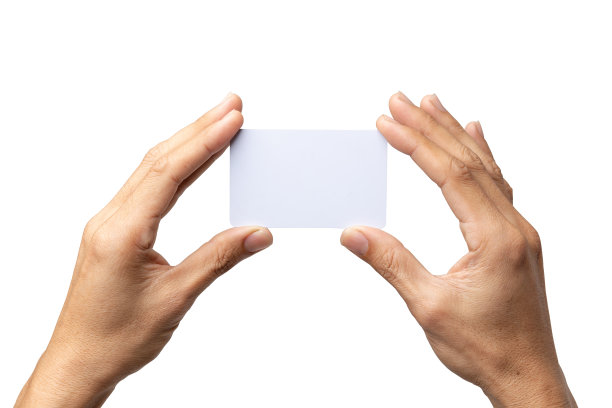 商人手握名片孤立在白色背景与剪辑路径图片下载