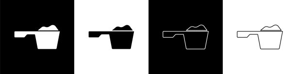 在黑白背景上，将洗衣粉放在量杯图标上。向量图片下载