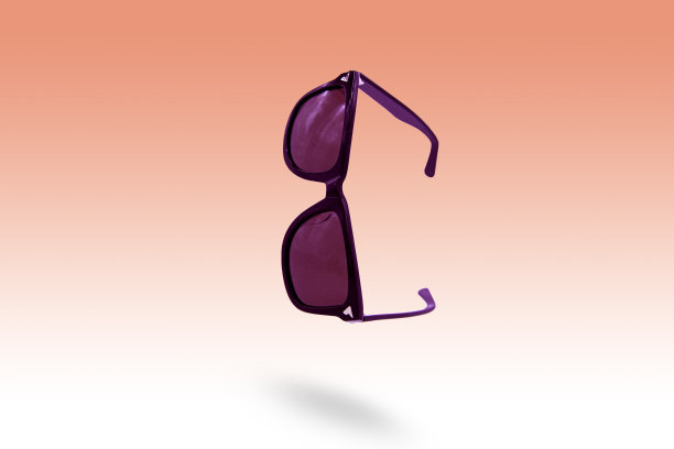 黑色太阳镜漂浮在空中。图片下载