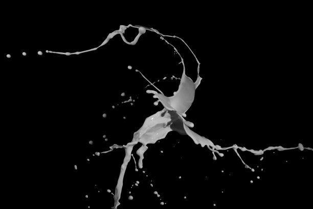 白色油漆飞溅孤立在黑色背景上。图片下载