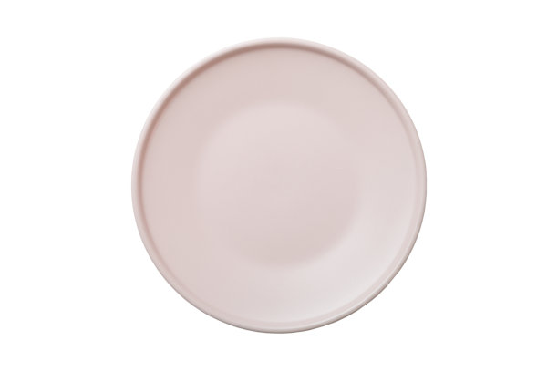 粉红色陶瓷圆板孤立在白色背景上。俯视图图片下载