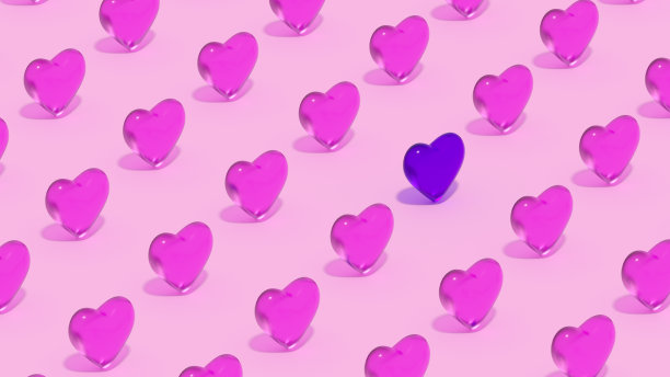 粉色背景上的情人节爱心图片下载