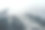 极简单色大气的山脉景观与大雪山顶部在低云。令人敬畏的极小的风景与岩石上的冰川。蓝白色的高山，云中飘雪。图片下载