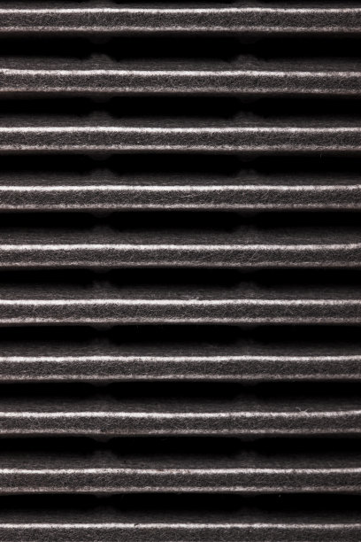 空气滤清器为车辆抽象近距离纹理背景。汽车保养更换零件。图片下载