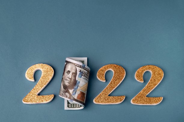 2022号，蓝色背景的一卷百元美钞。图片下载