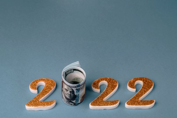 2022号，蓝色背景的一卷百元美钞。图片下载