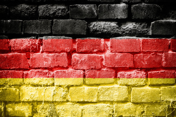 砖墙上的德国grunge旗帜图片下载
