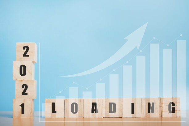 安排木立方体堆放，2021年和加载文本与图形财务数据。图片下载
