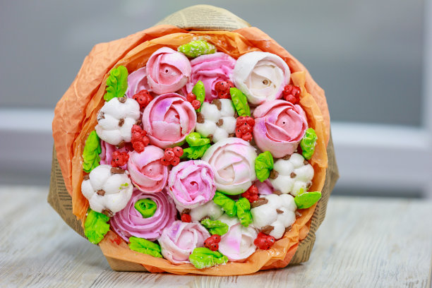 由棉花糖制成的可食用的礼物花束。有选择性的重点。带有复制空间的背景图片下载