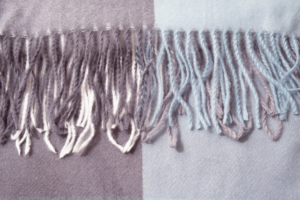 流苏背景的羊绒围巾。俯视图图片下载