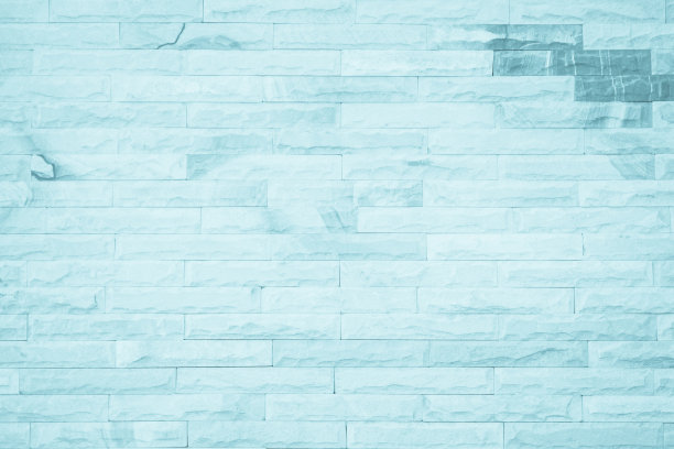柔和的蓝色和白色砖墙纹理背景。砖漆为蓝色，内部岩石旧图案干净的混凝土网格不均匀的砖设计堆叠。家庭或办公室设计背景装饰。图片下载