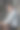西班牙青年靠墙站着图片下载