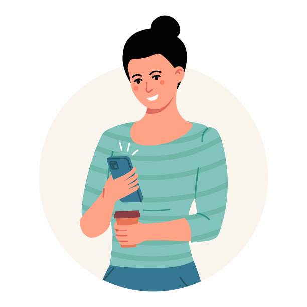 身穿绿色毛衣的年轻女子正在使用智能手机聊天，或者拿着咖啡杯聊天图片下载